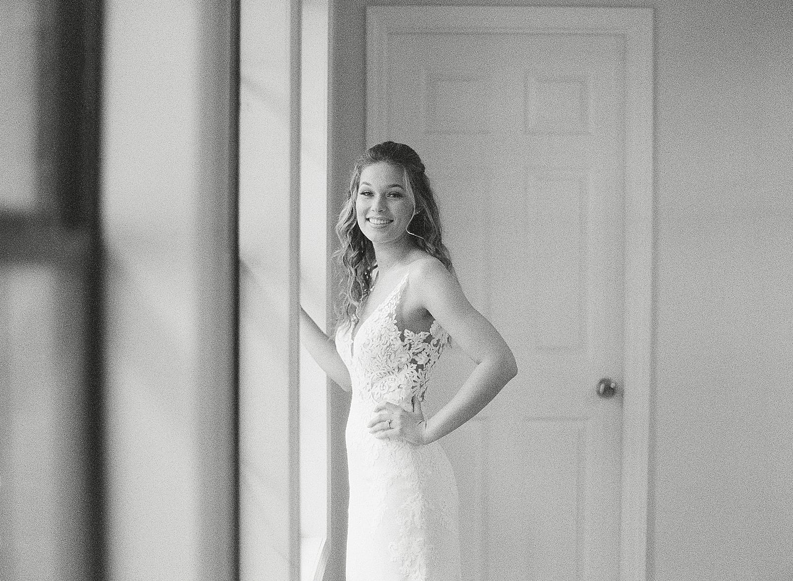 Savannah GA Wedding Photographer Black and White of Bride by window photo