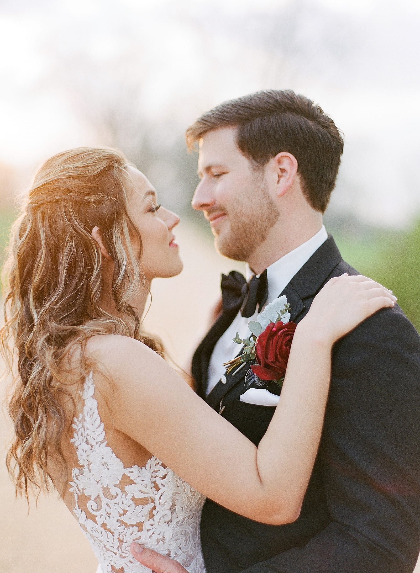 Savannah GA Wedding Photographer Couple Hugging and Smiling at Each Other Photo