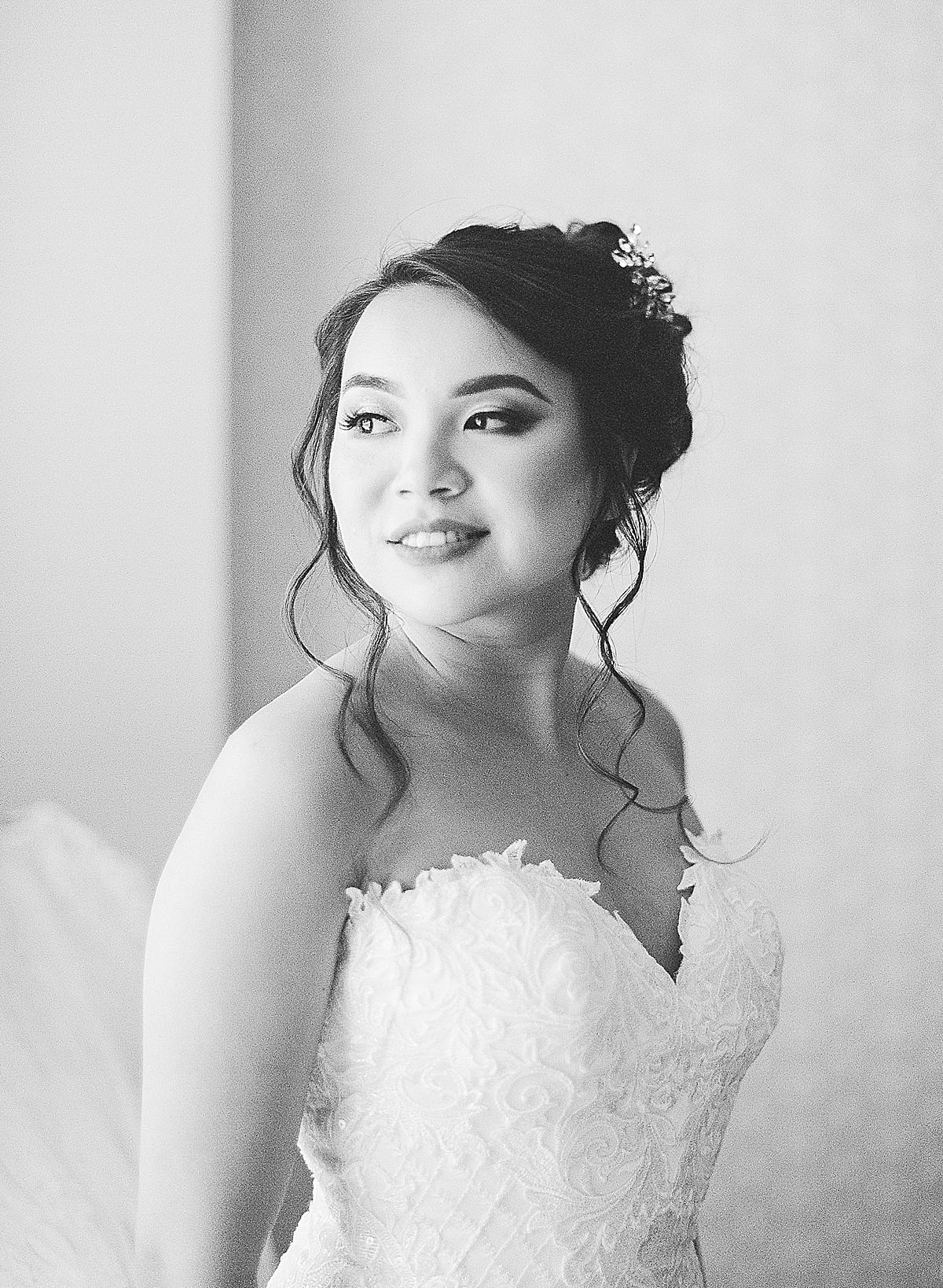 Black and White of Bride Looking Over Her Shoulder Photo