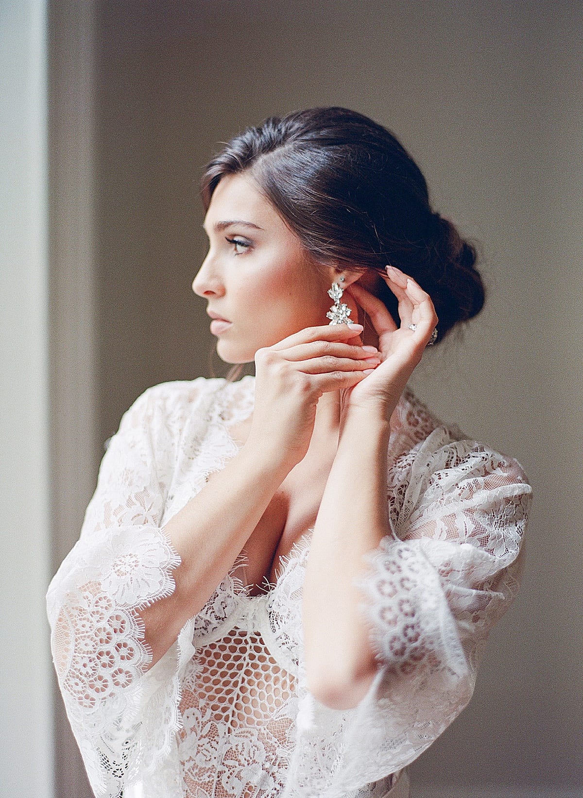 Boudoir Ideas Bride Getting Ready in Lace Robe Photo