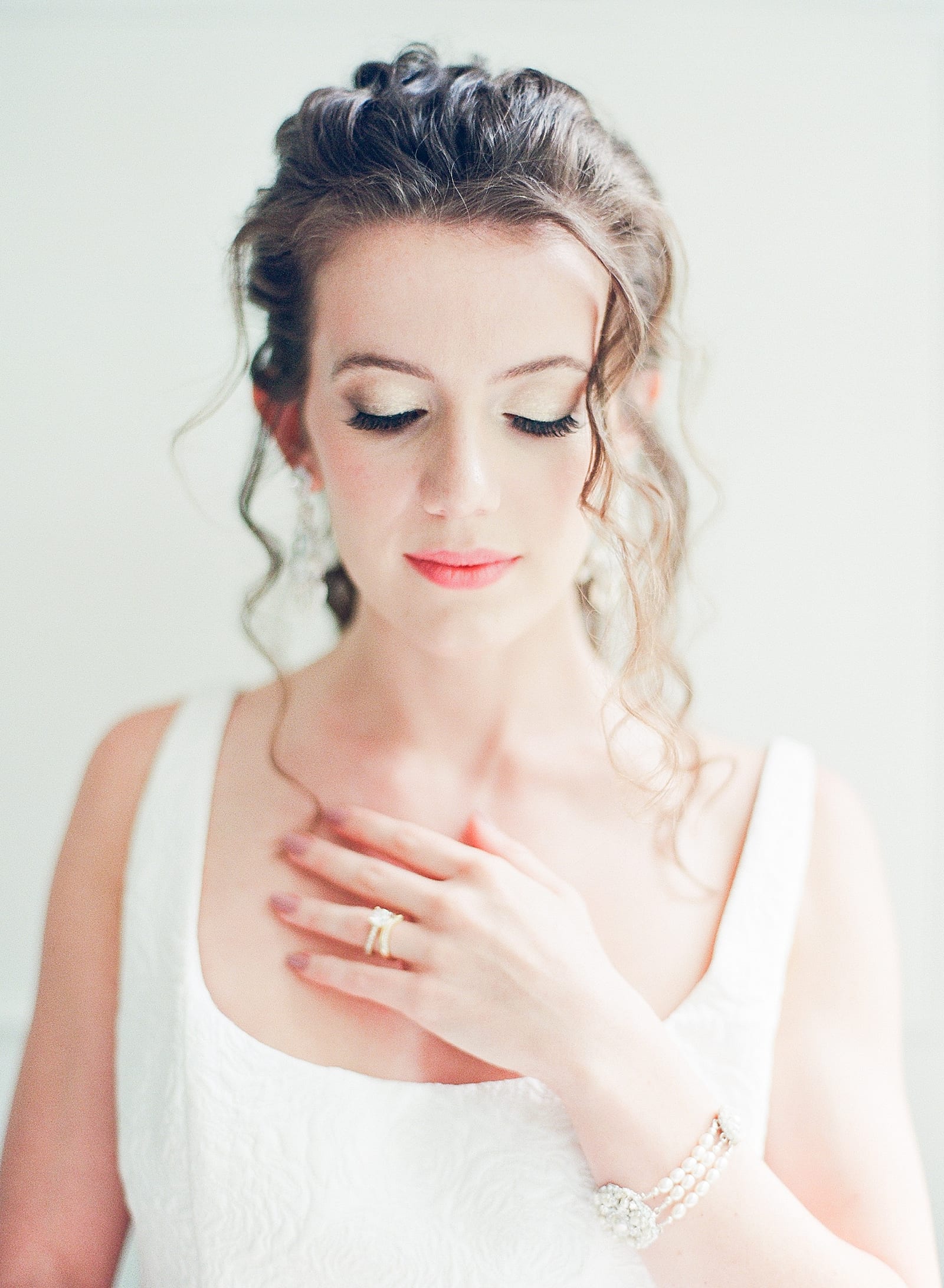 Bridal Portraits Bride Looking Down with Hand on Chest Photo