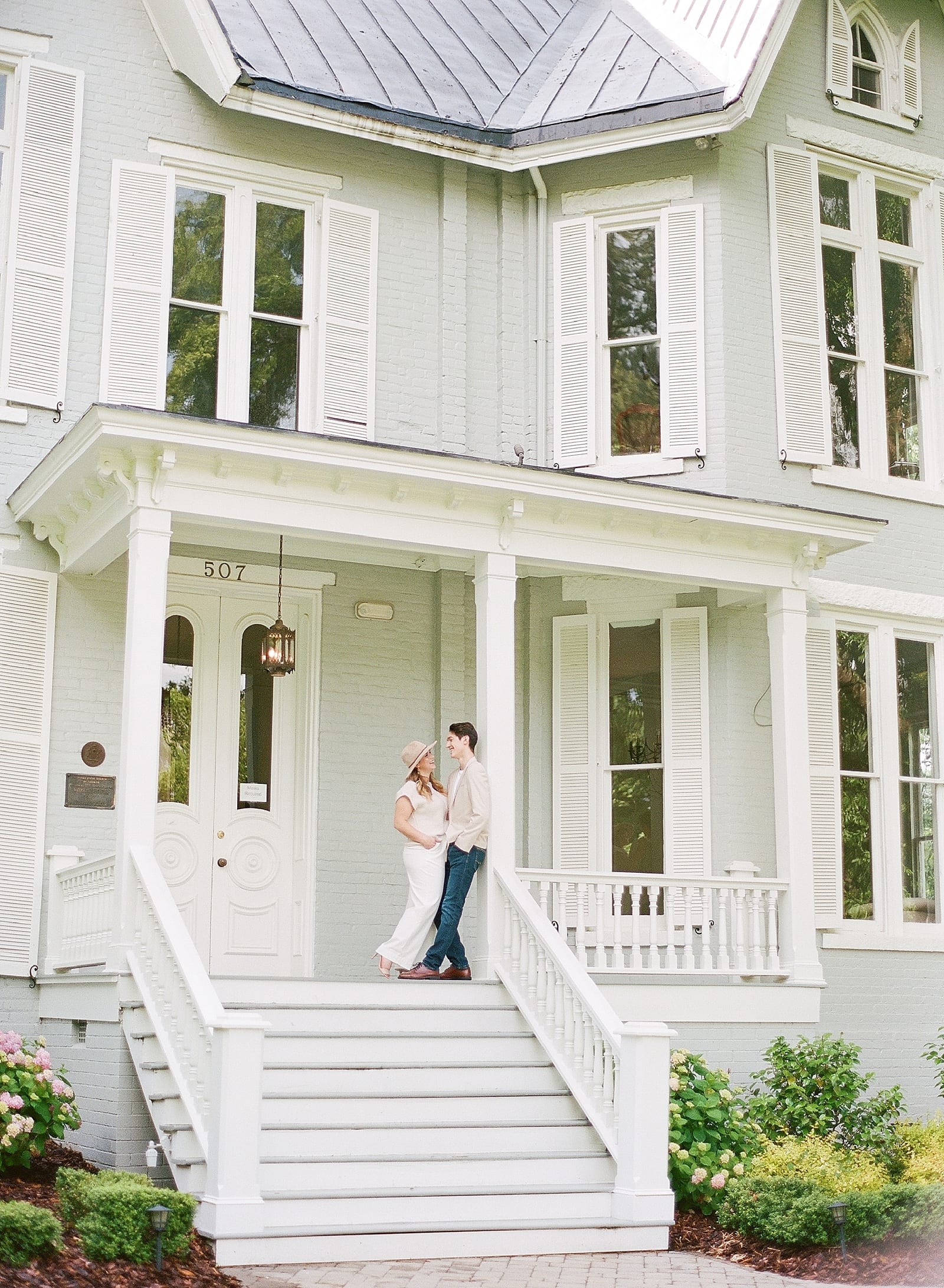 Greensboro NC Engagement Couple on Front Porch Photo