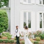 Greensboro NC Wedding Venues Bride and Groom Walking Holding Hands Photo