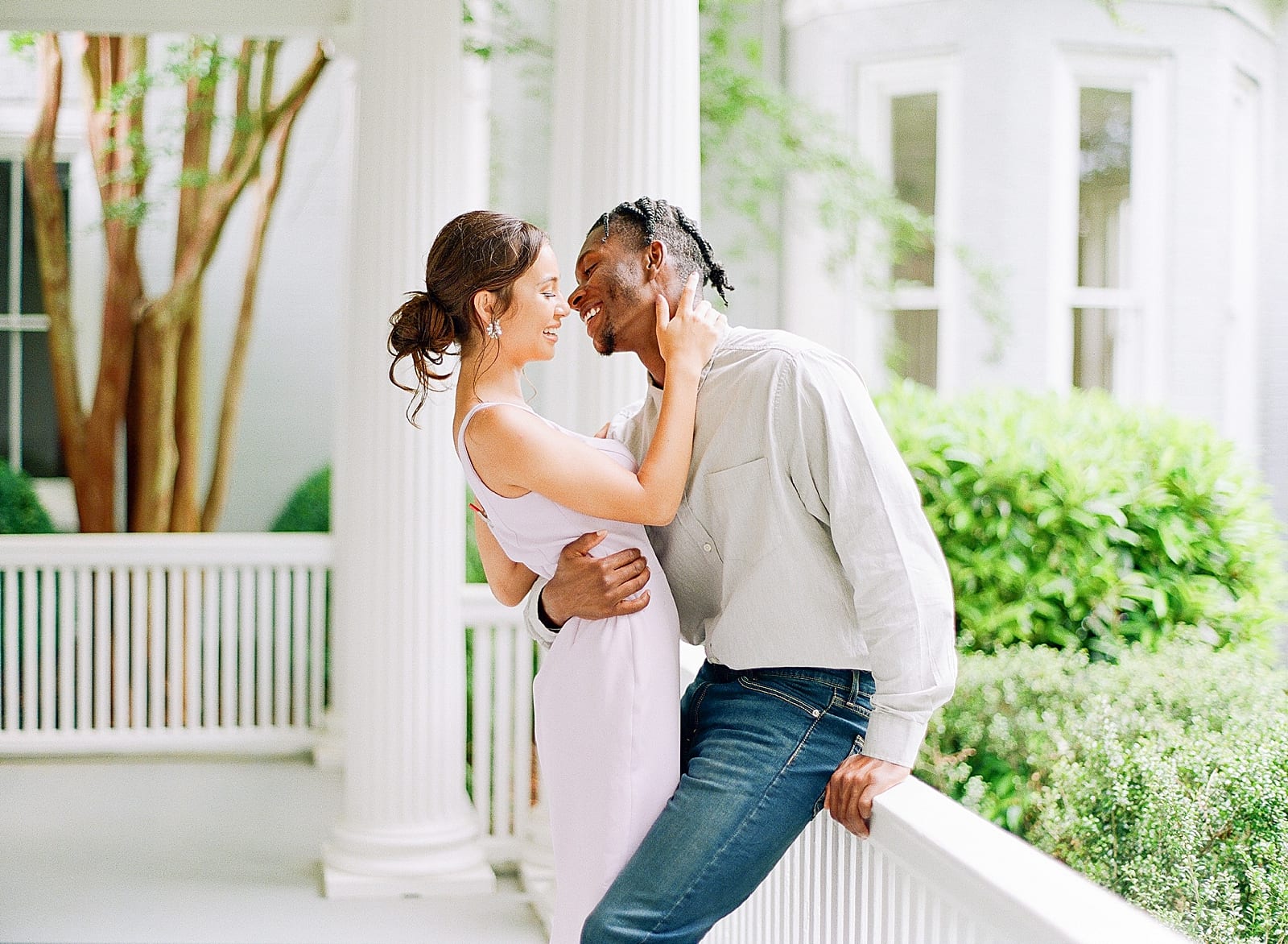 McAlister Leftwich House Engagement Couple Laughing On Porch Photo