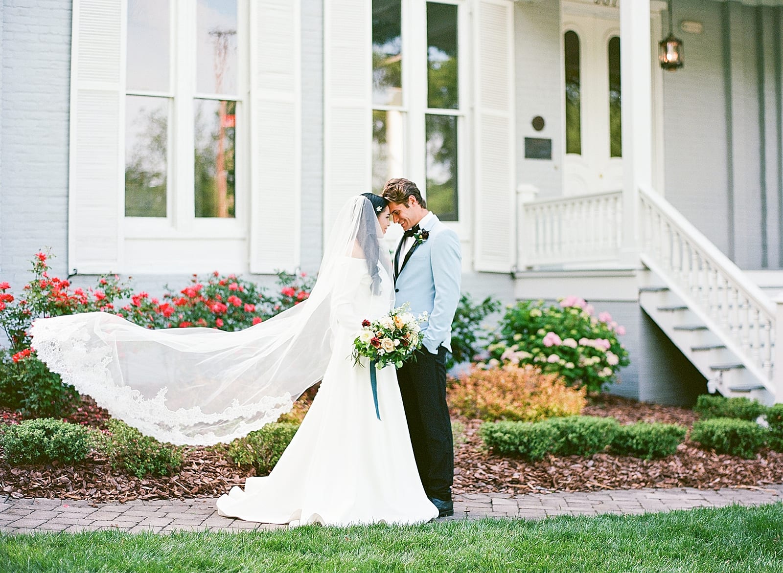 McAlister Leftwich House Wedding Bride and Groom with Flowing Veil Photo