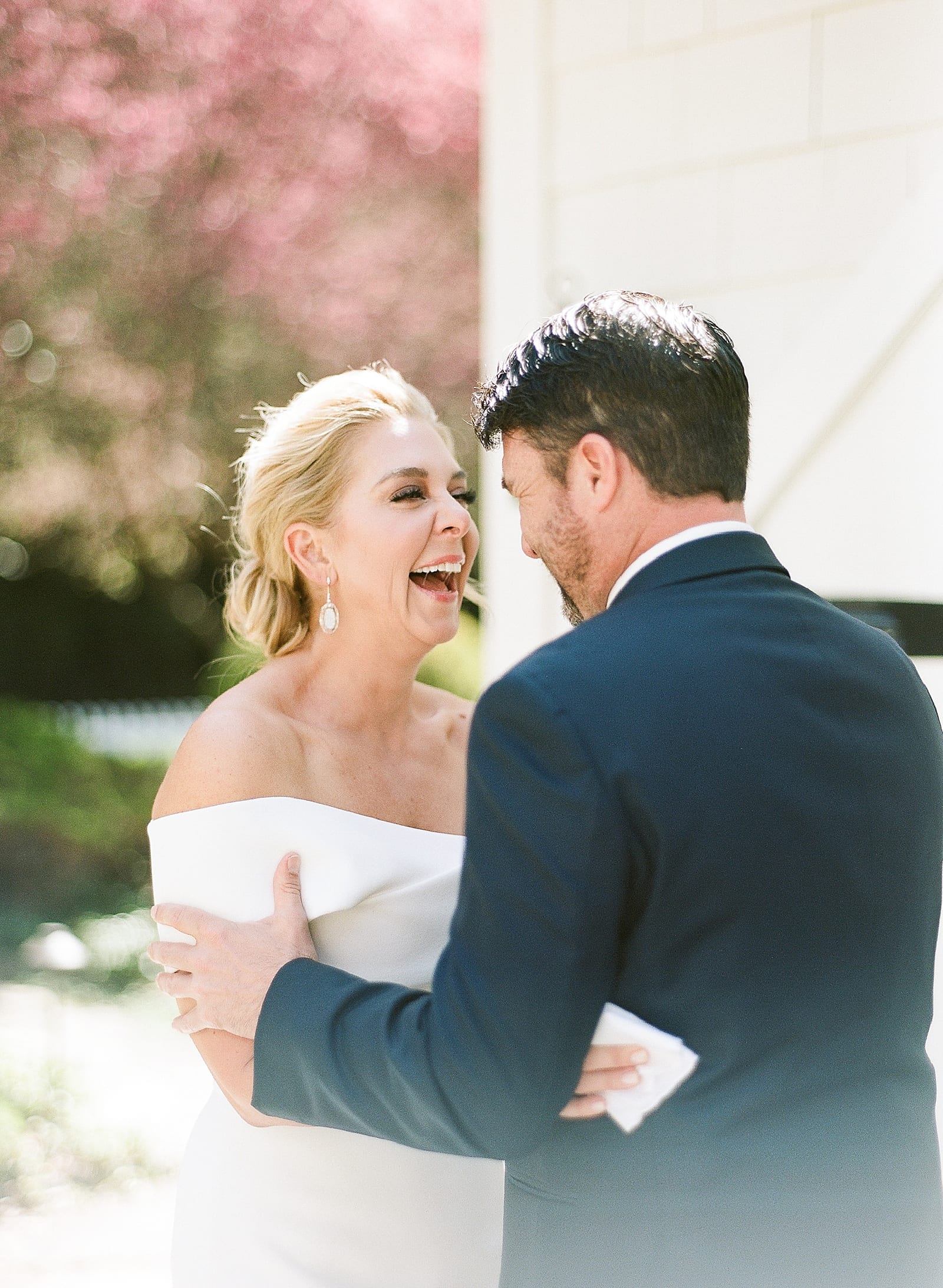 Bride and Groom Laughing Together Photo