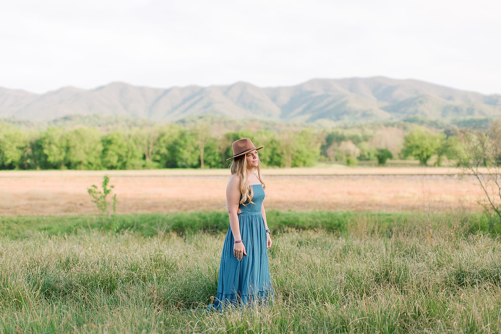 Asheville Senior Photos girl in blue dress in field photo