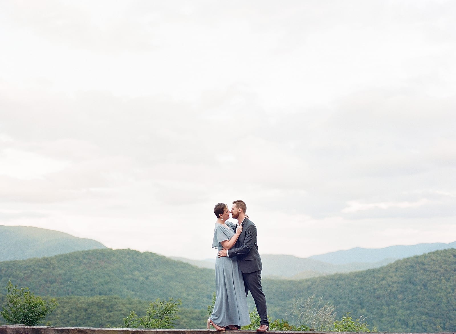 Blue Ridge Parkway North Carolina Couple Hugging in front of Mountains Photo