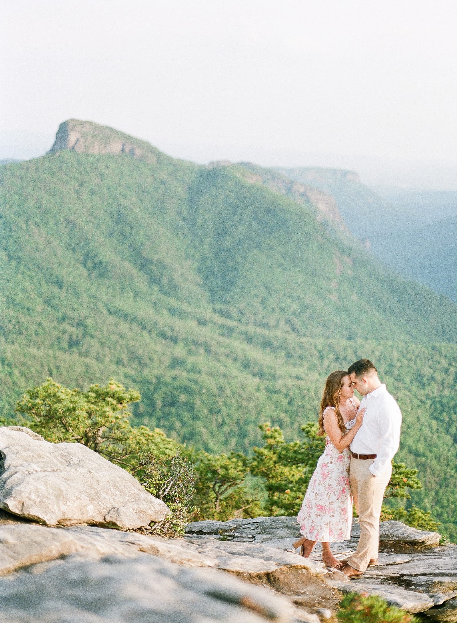 Hawksbill Mountain NC Couple Nose to Nose Table Rock in Background Photo