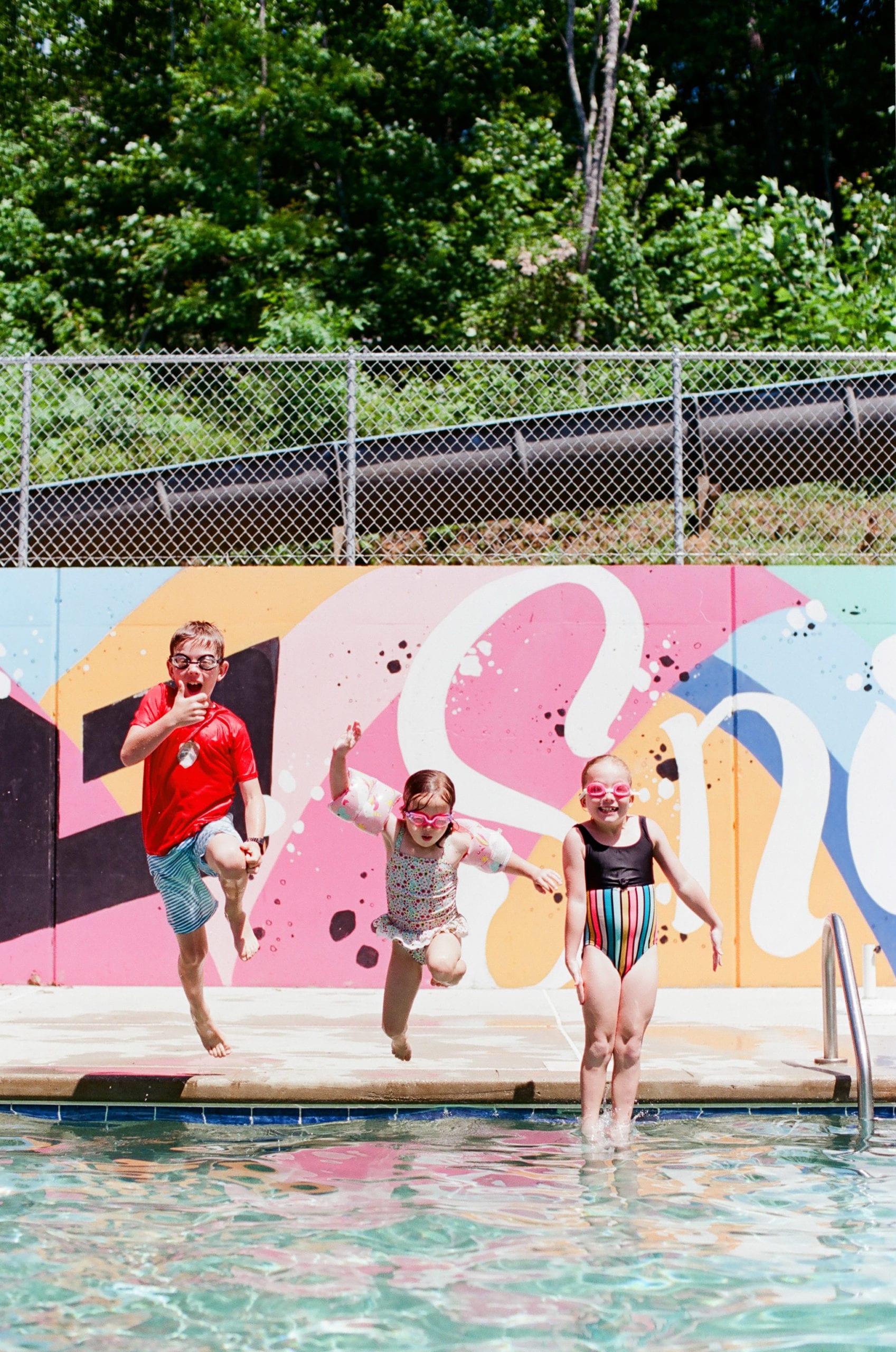 Kodak Ektar 100 kids jumping in pool photo