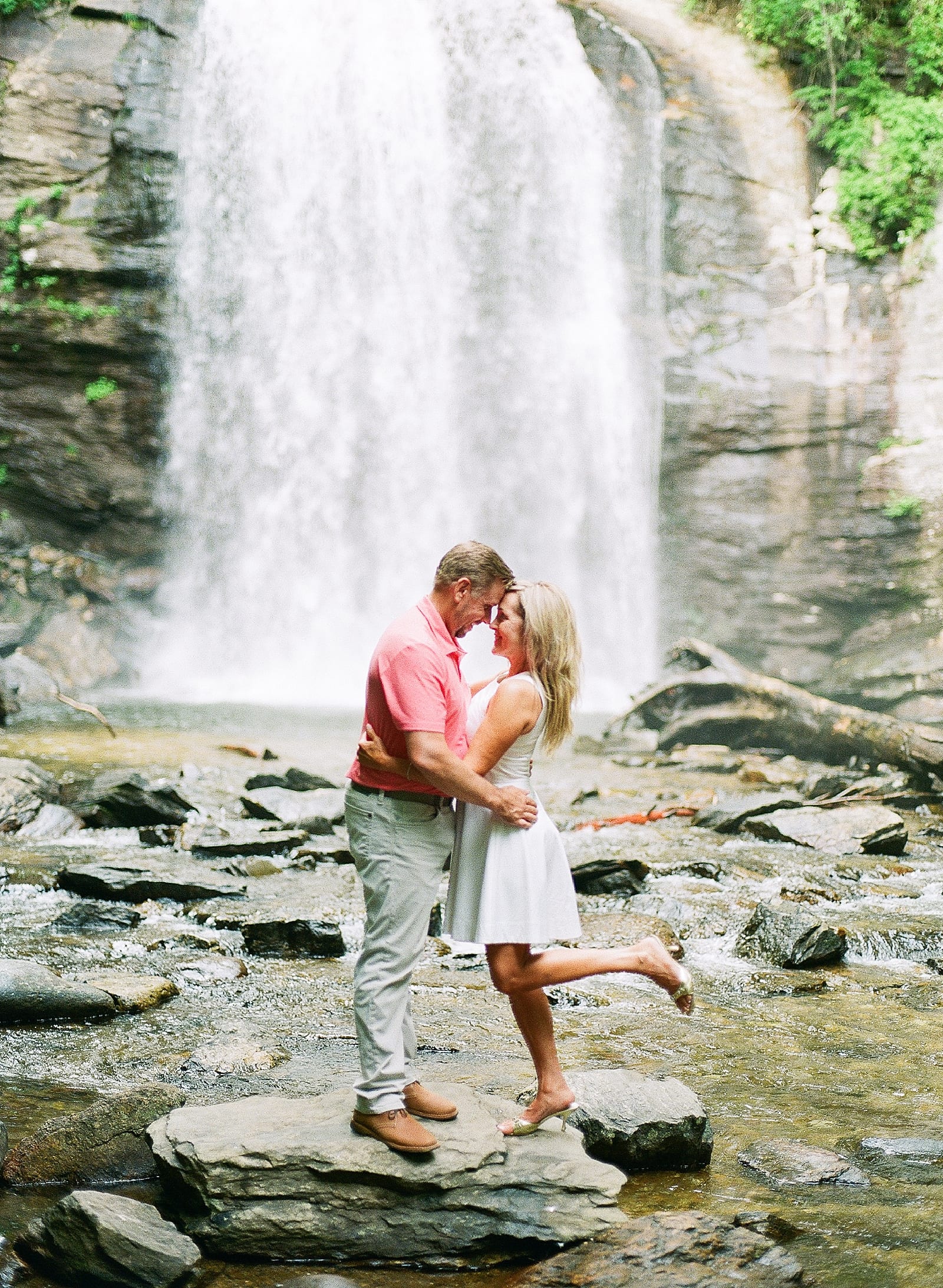 Looking Glass Falls NC Couple in River on Rock Photo