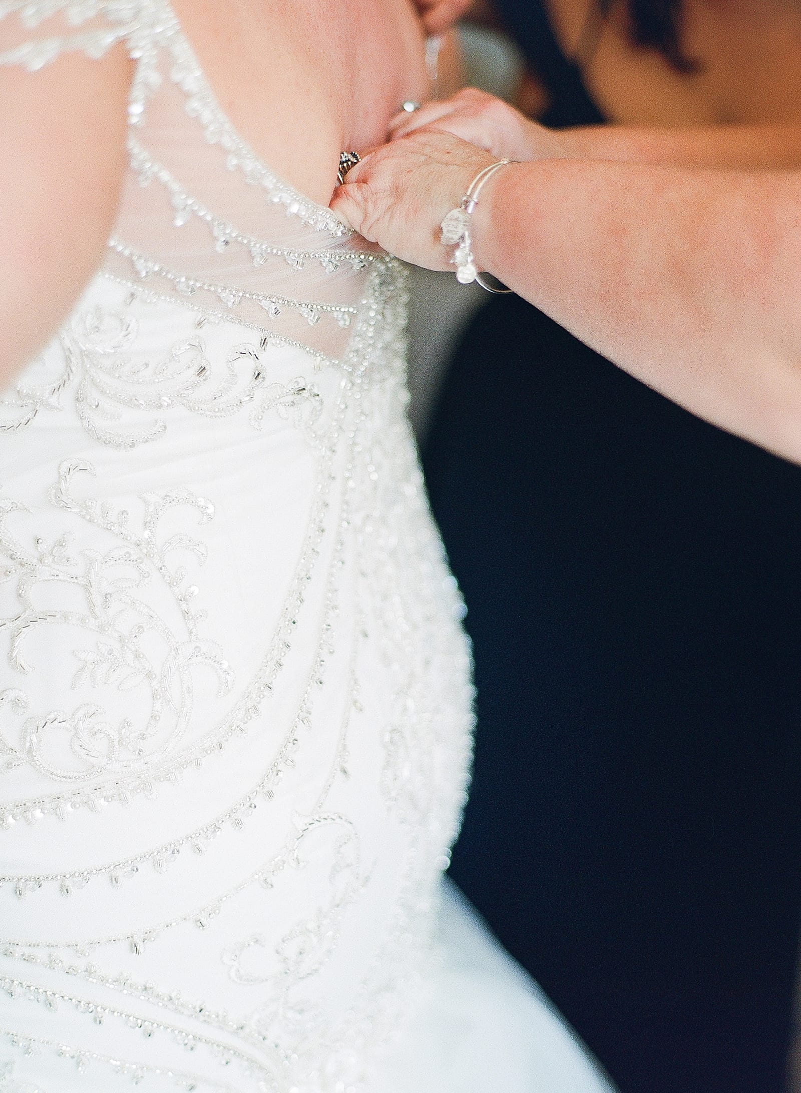Orlando Wedding Photographer Bride Getting Dress Buttoned Up Photo