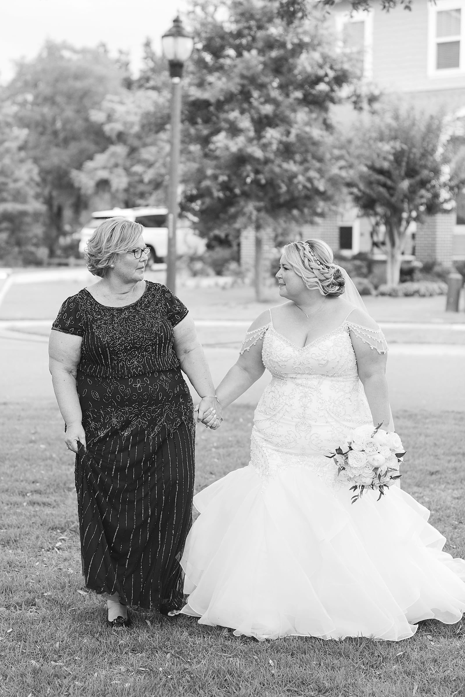 Black and White of Mom walking Bride Down the aisle Photo