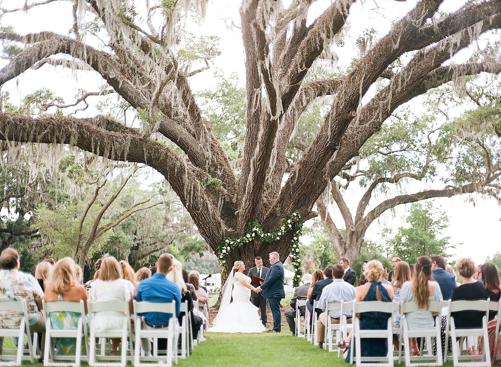 Orlando Wedding Photographer Bride and Groom at Oak Tree Ceremony Photo