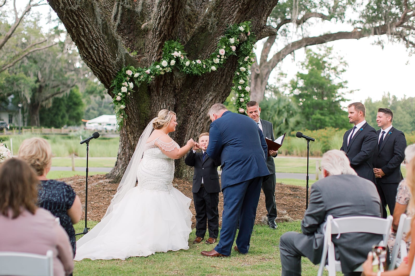 Orlando Wedding Photographer Bride and Groom Pinky Promising Son Photo
