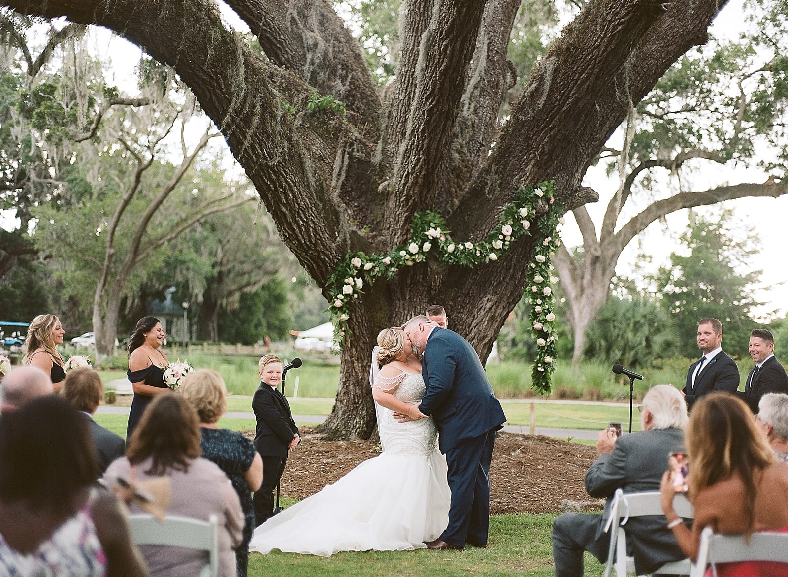 Orlando Wedding Photographer Bride and Groom First Kiss Photo
