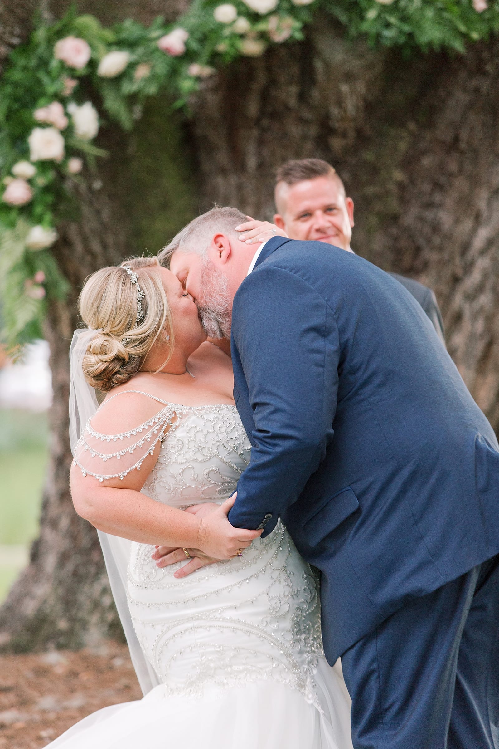 Orlando Wedding Photographer Bride and Groom First Kiss Photo
