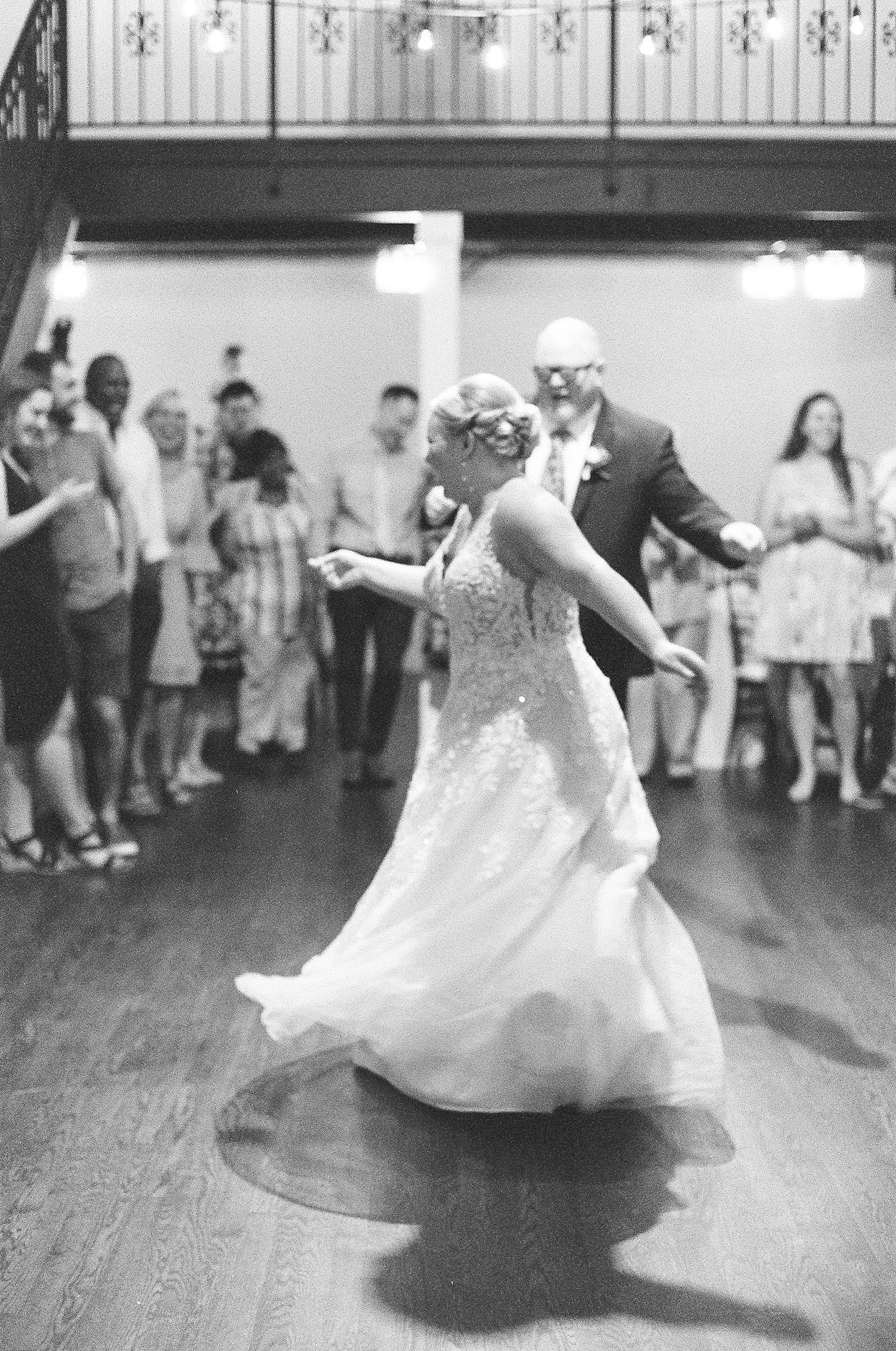 Black and White of Bride Dancing with Her Father Photo