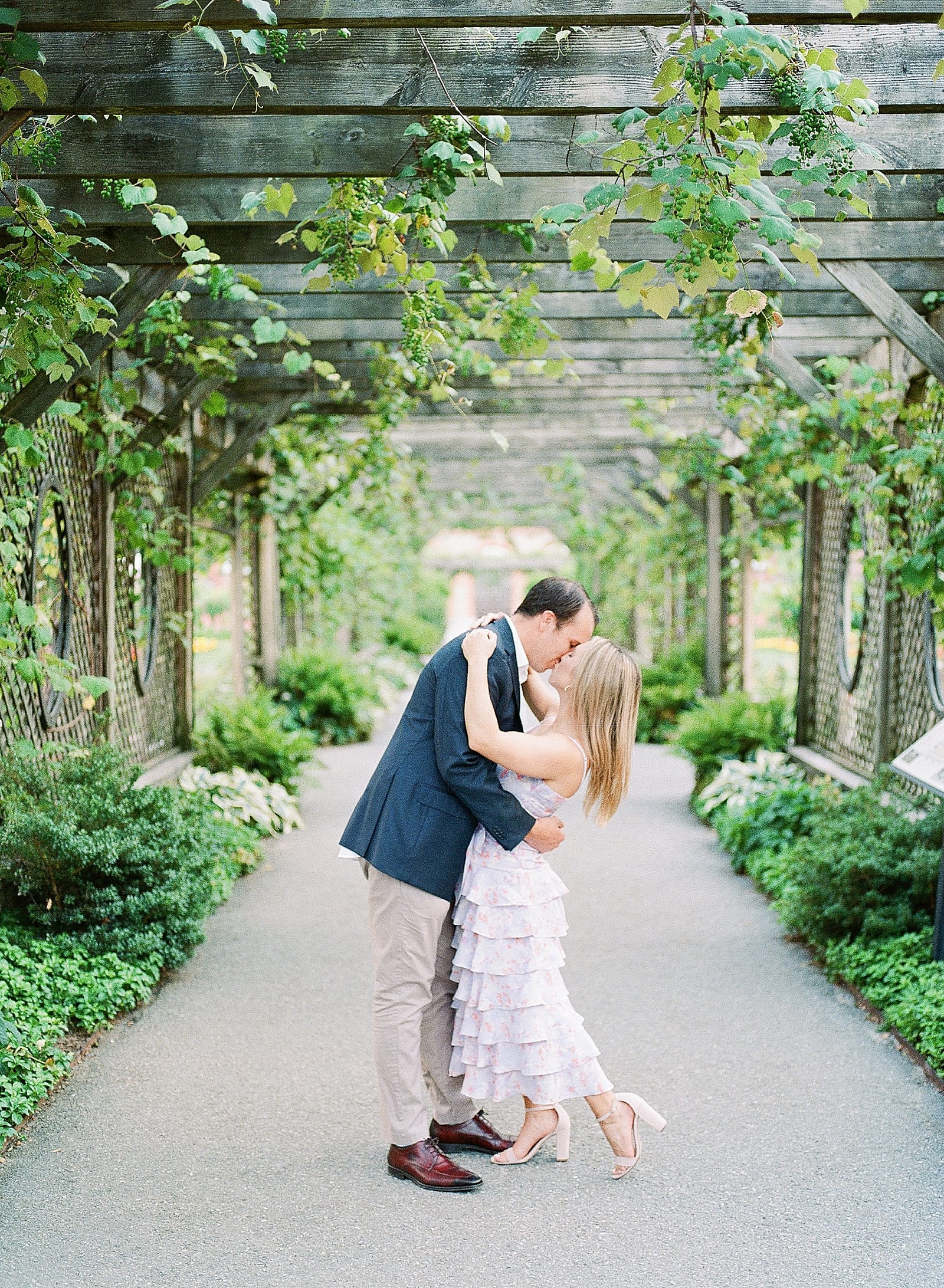 Couple Kissing Under Arbor at Biltmore In Asheville Conservatory Photo
