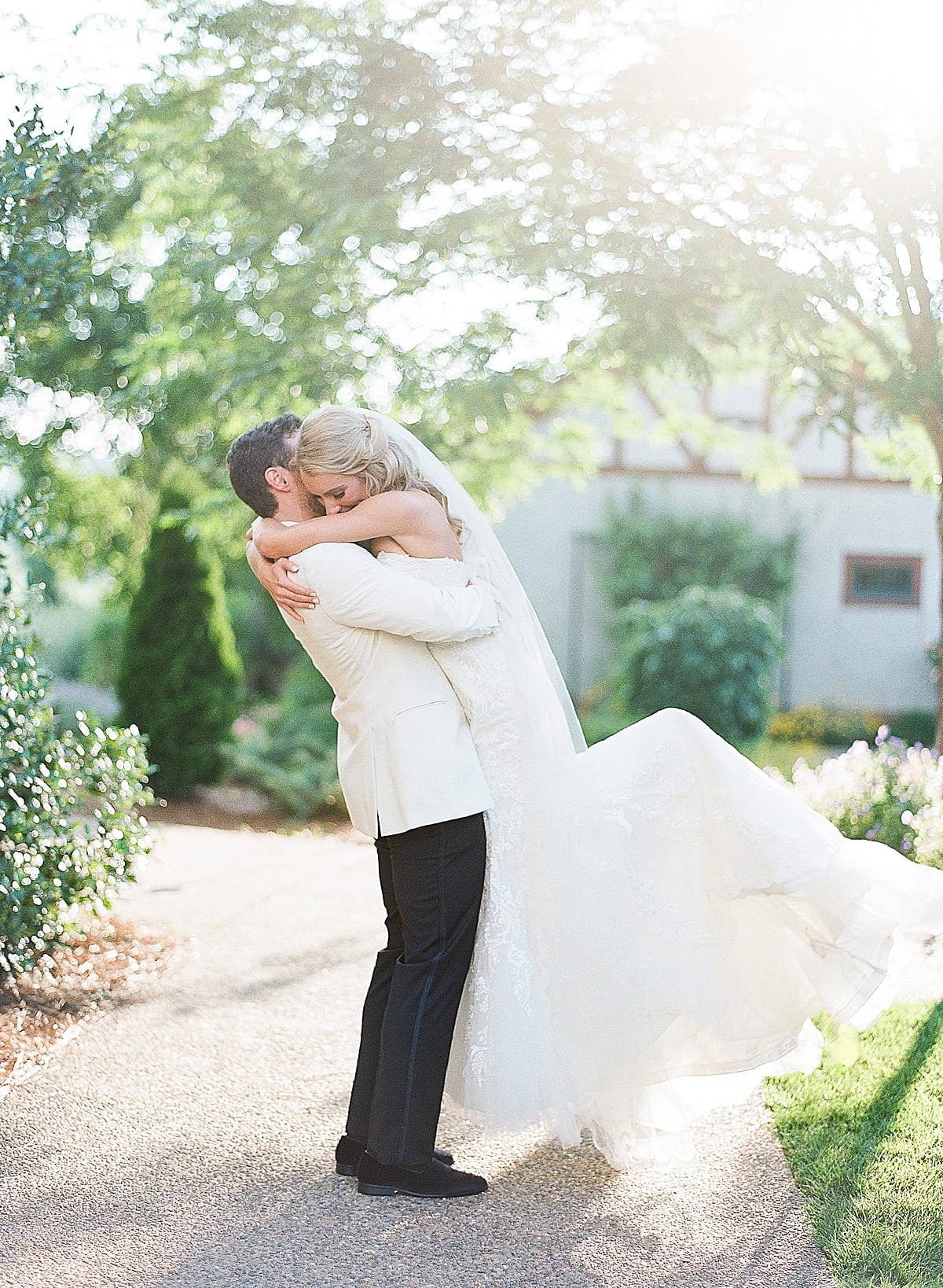 Biltmore Wedding Bride and Groom Hugging at The Winery Photo