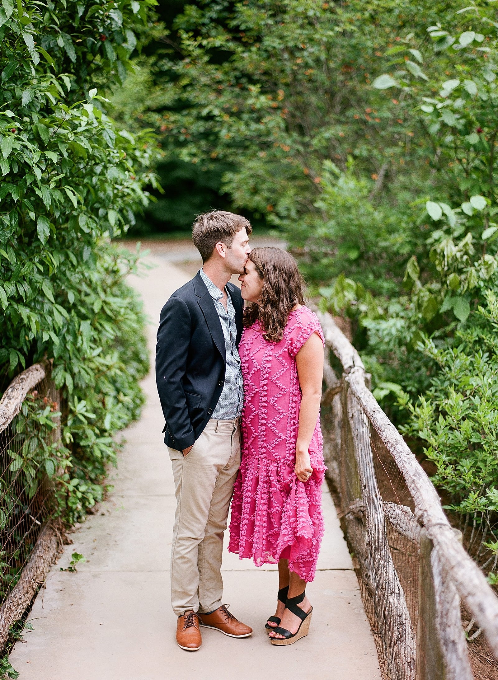 Romantic Biltmore Locations Couple on Bass Pond Bridge Photo