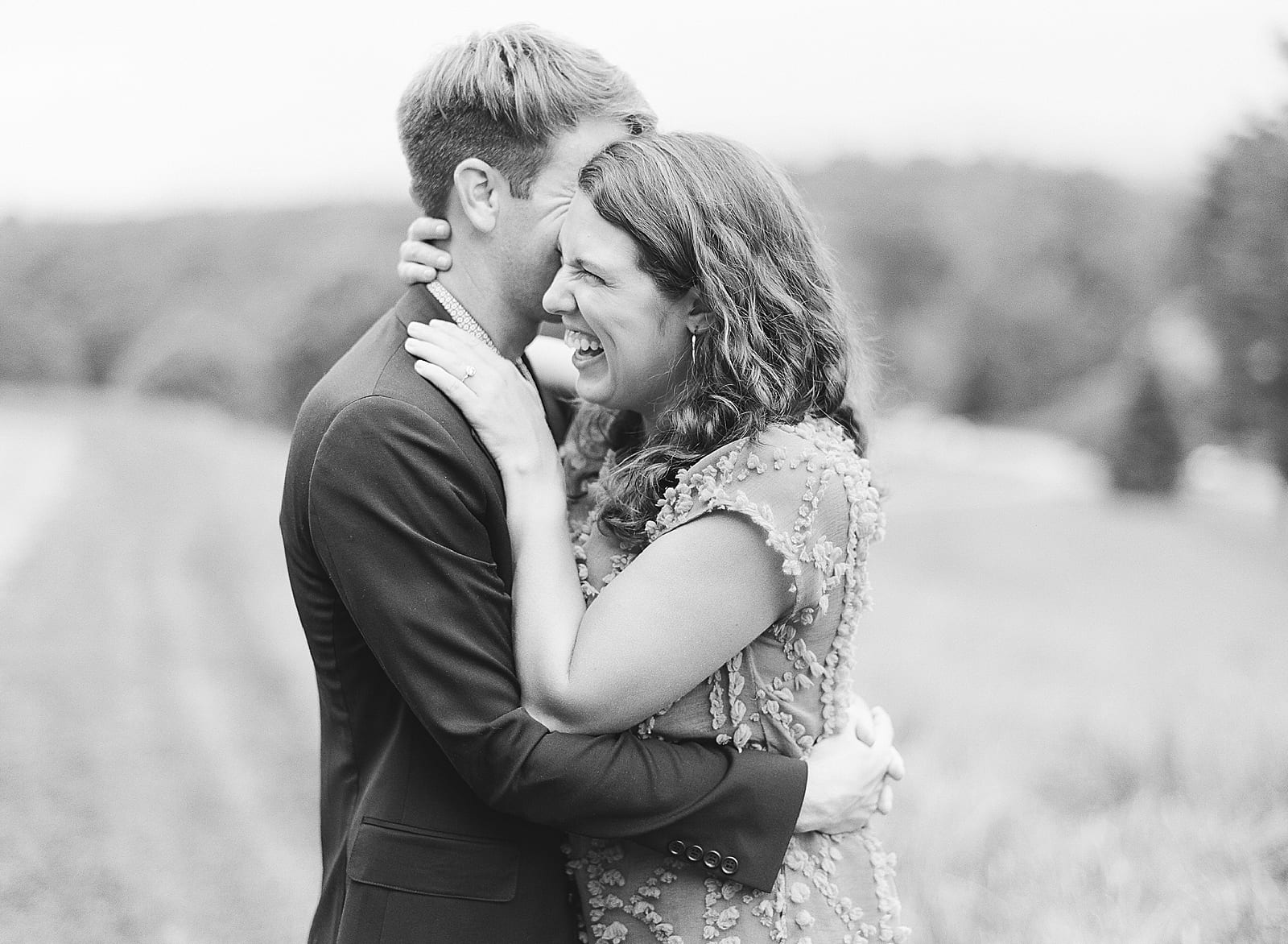 Black and White of Couple Laughing Together Photo