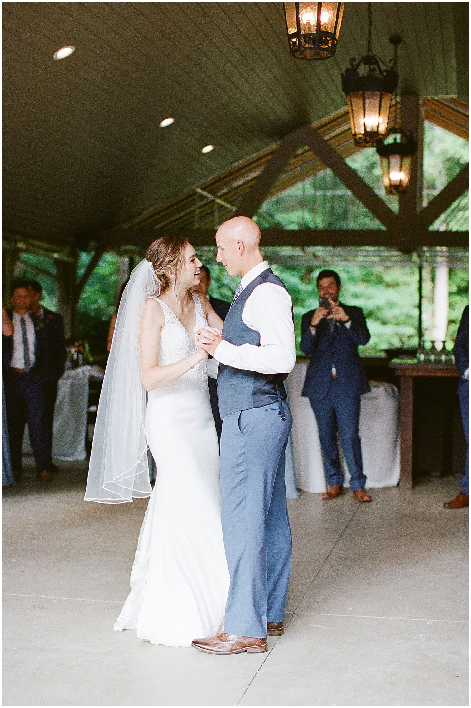Bride and Groom Laughing First Dance at Reception Photo
