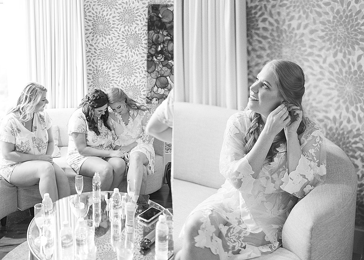 Black and White of Girls on Couch and Bride Putting Earrings On Photo