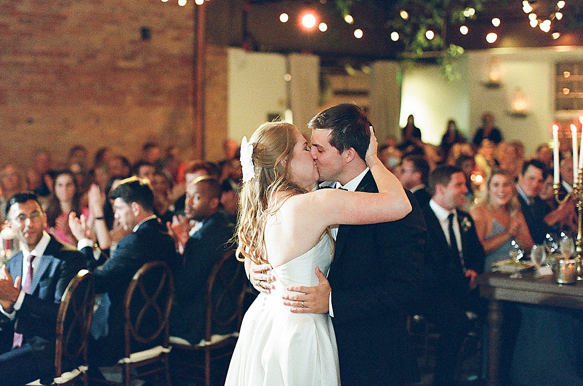 Bride and Groom First Dance Kissing Photo