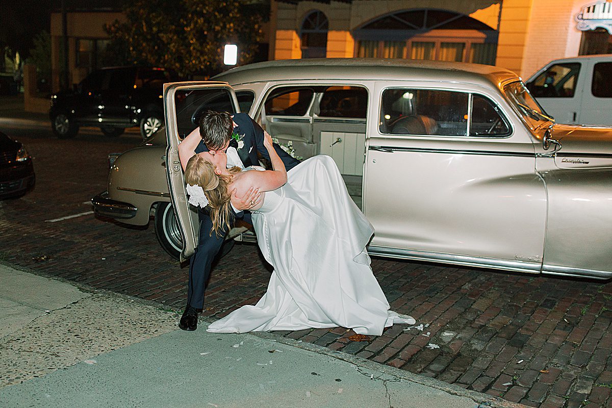 Asheville North Carolina Wedding Reception at The Venue Dip Kiss at Car Photo