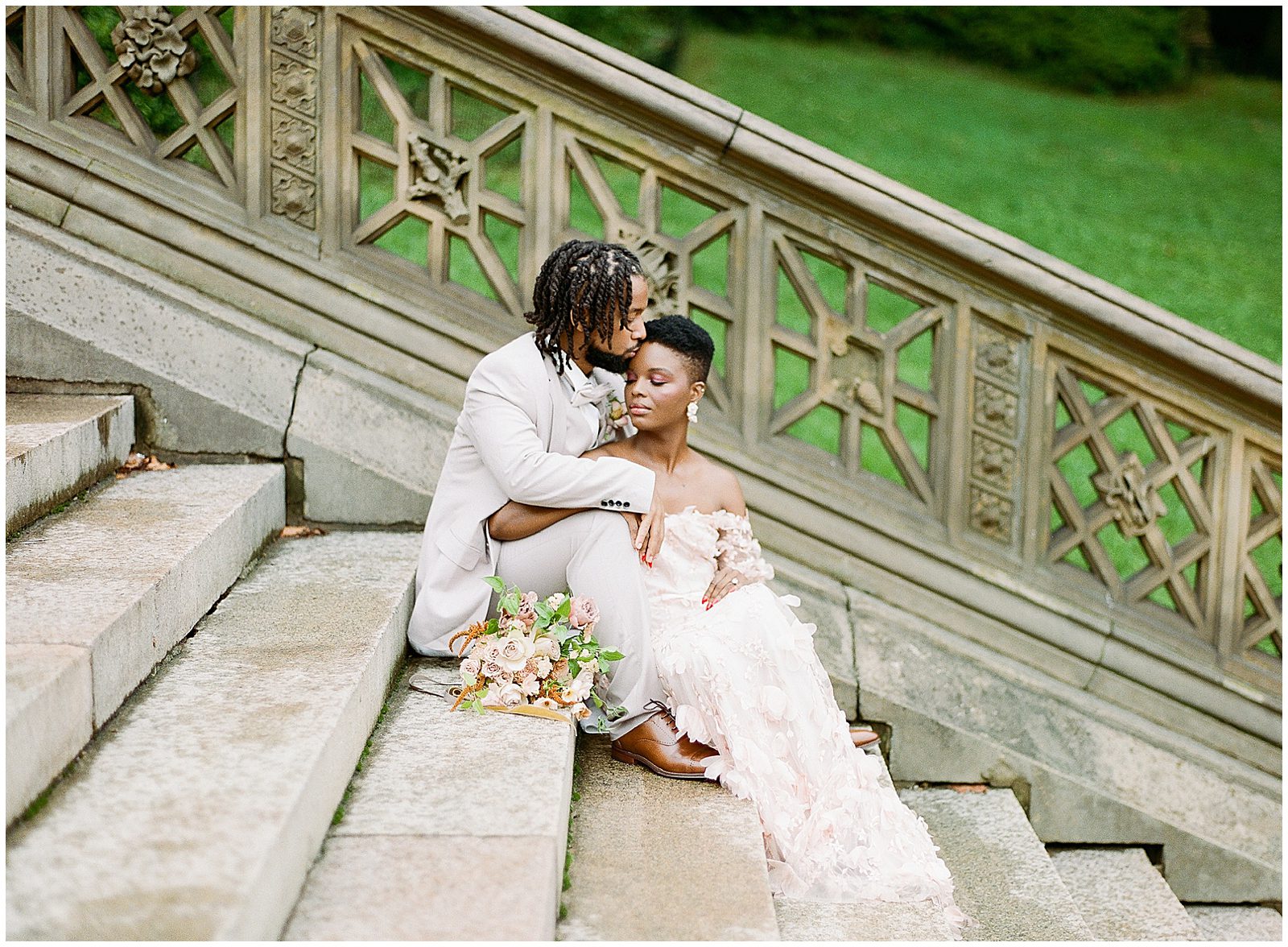 Central Park Wedding Bride and Groom Sitting On Bethesda Terrace Stairs Photo