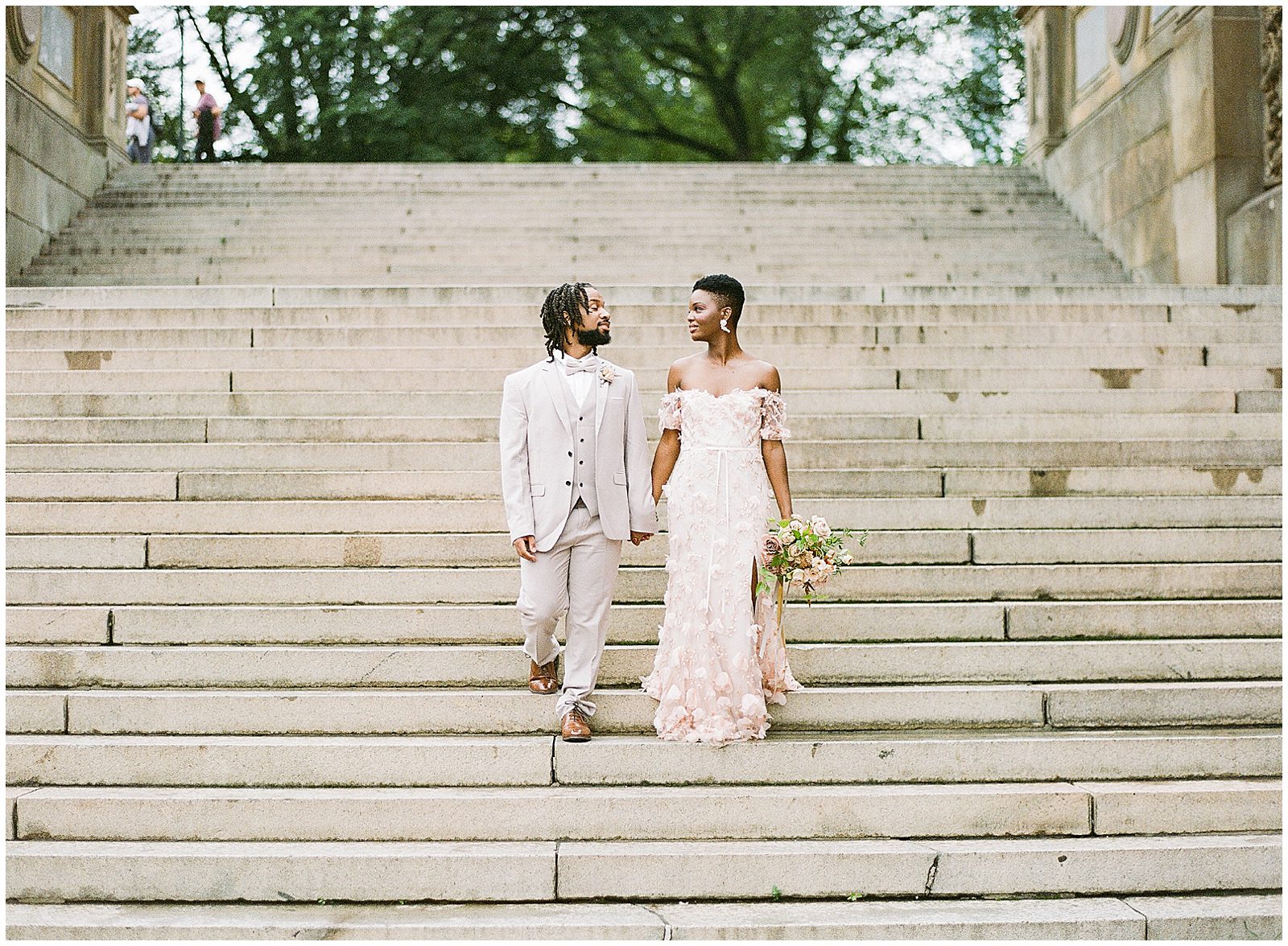 Central Park Wedding Bride and Groom Walking Down Bethesda Terrace Stairs Photo