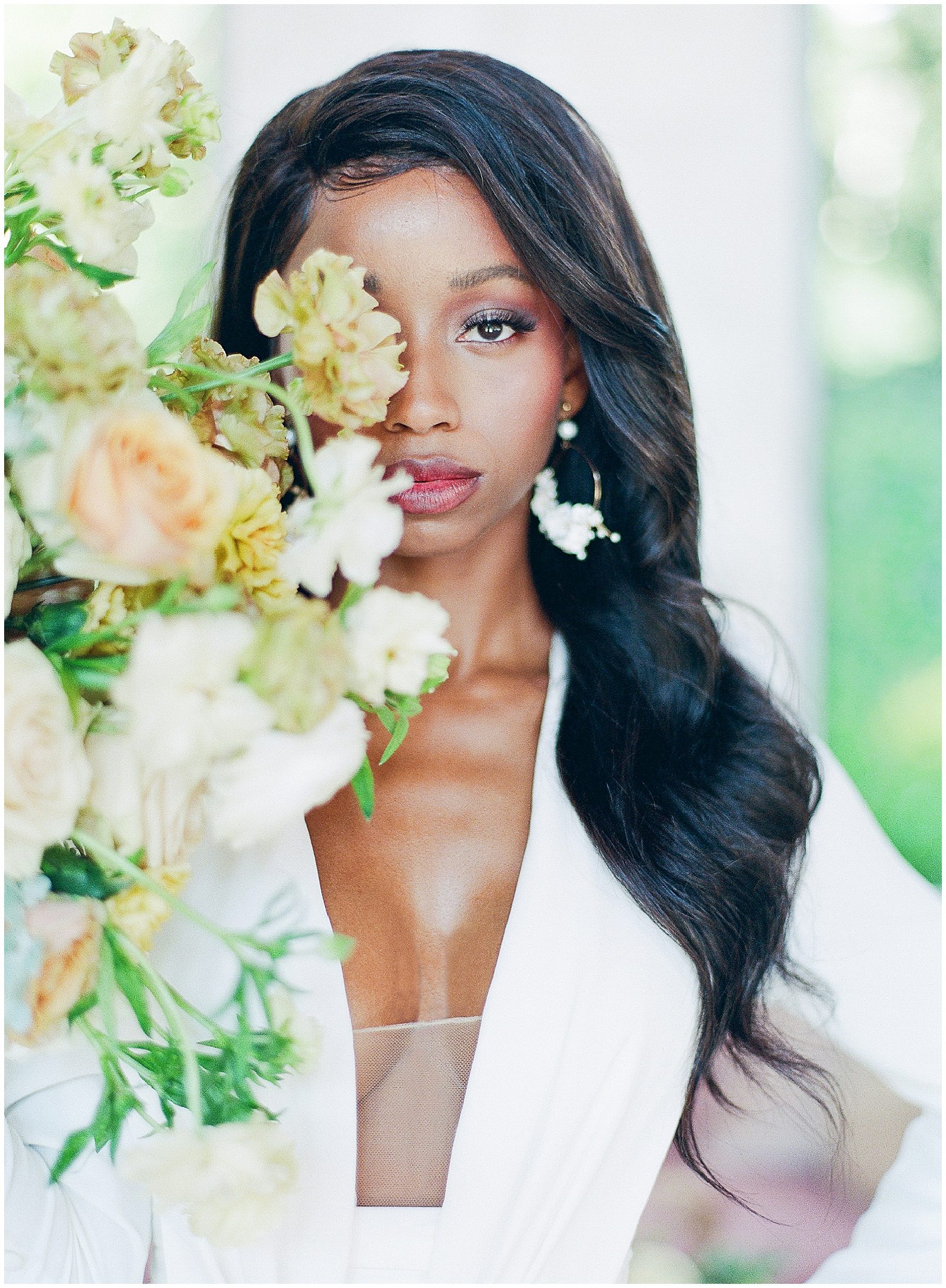 Charlotte NC Bridal Session Bride with Flowers in Front of her Face Photo