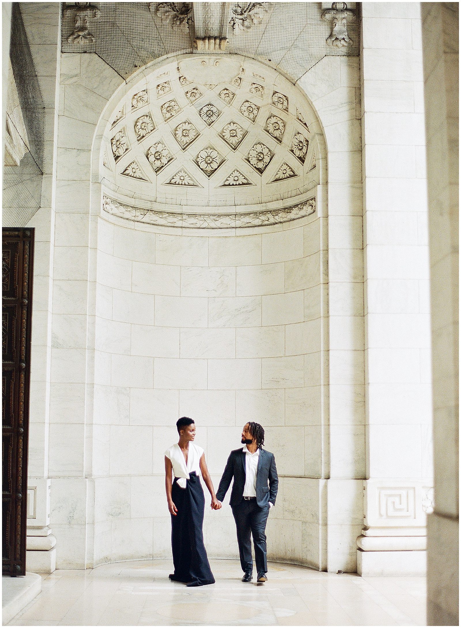 New York City Engagement Photos Couple Holding Hands at The NYC Library Photo