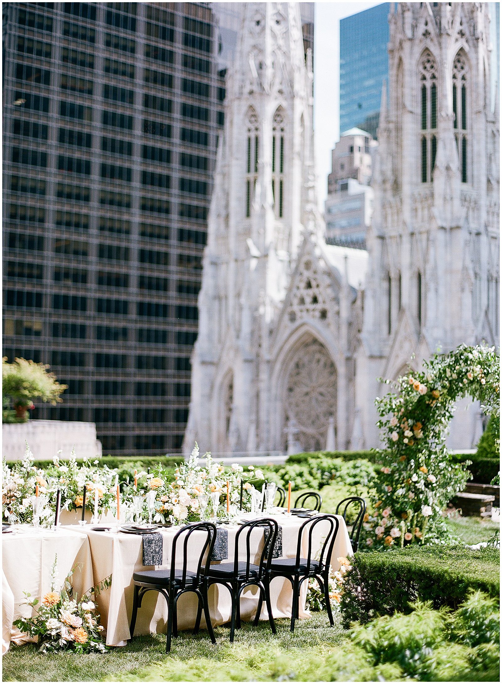 New York City Wedding Venue 620 Loft and Gardens Wedding Reception Table with St.Patricks Cathedral in Background Photo