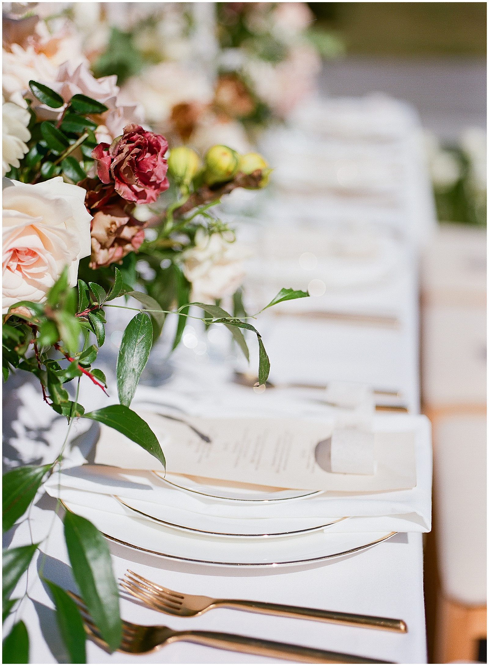 Wedding Reception Florals and Place Settings Photo