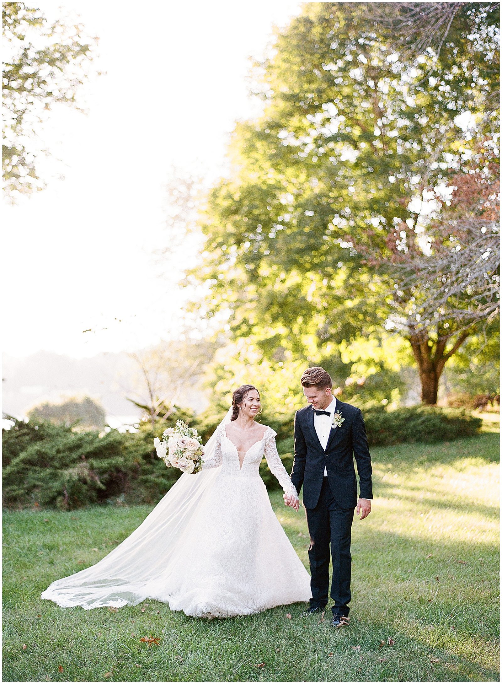 Tennessee Wedding Photographer Captures Bride and Groom Walking Holding Hands Photo