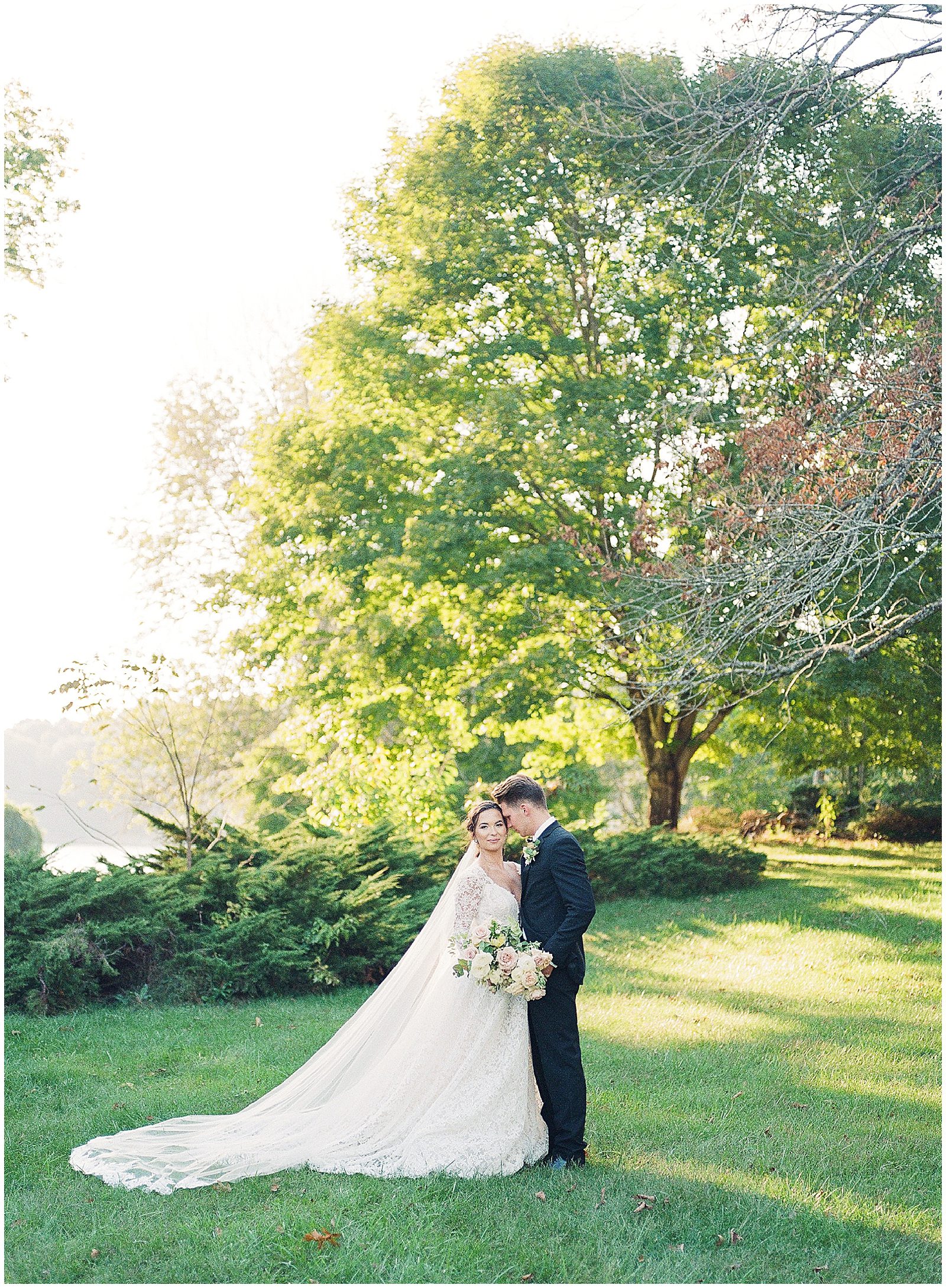Bride and Groom In Field at Tennessee Wedding Venue The Lakehouse Photo