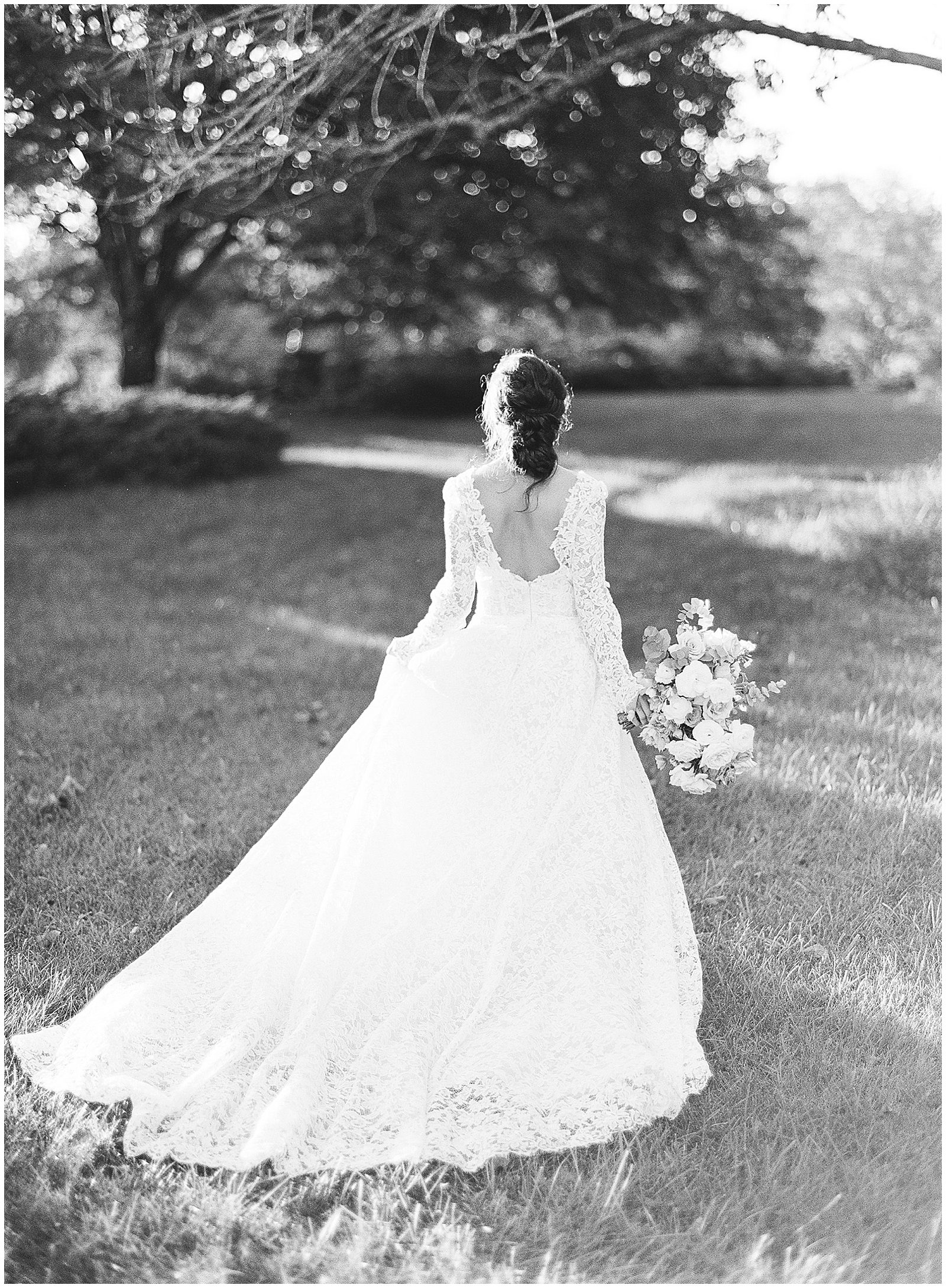 Black and White of Bride Walking Away Photo