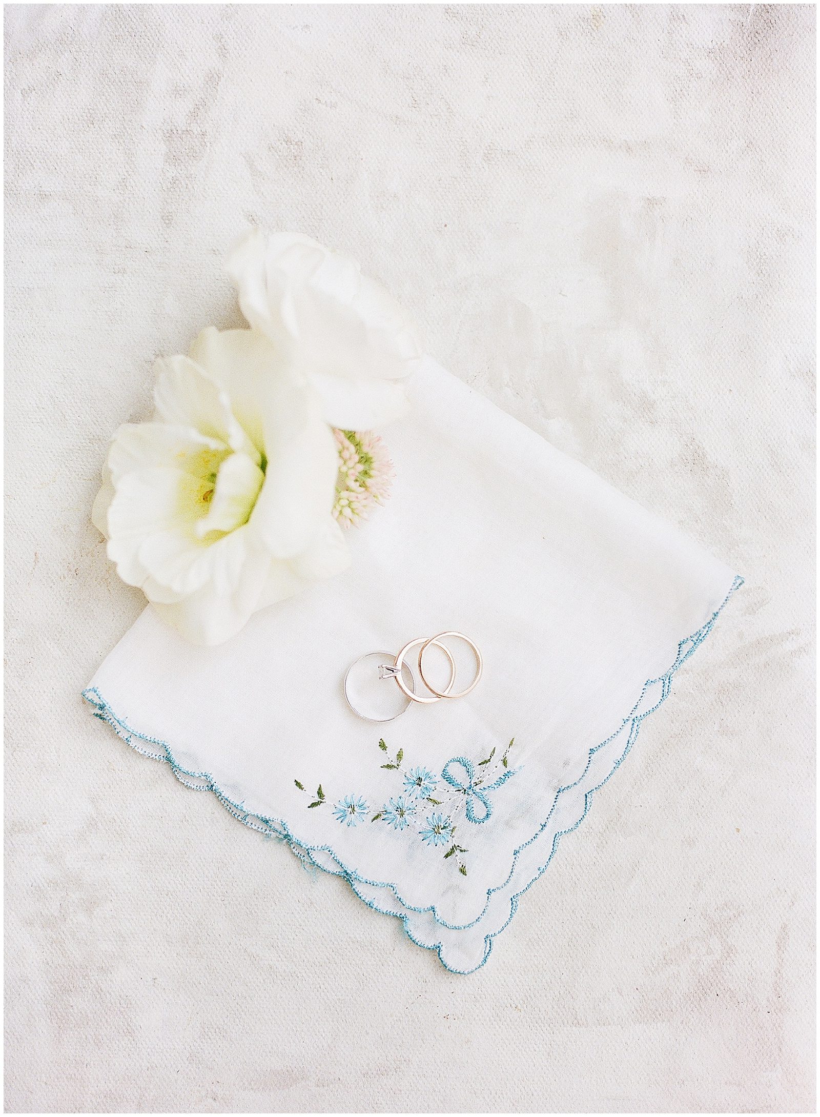 Wedding Details Handkerchief with Flowers and Rings Photo