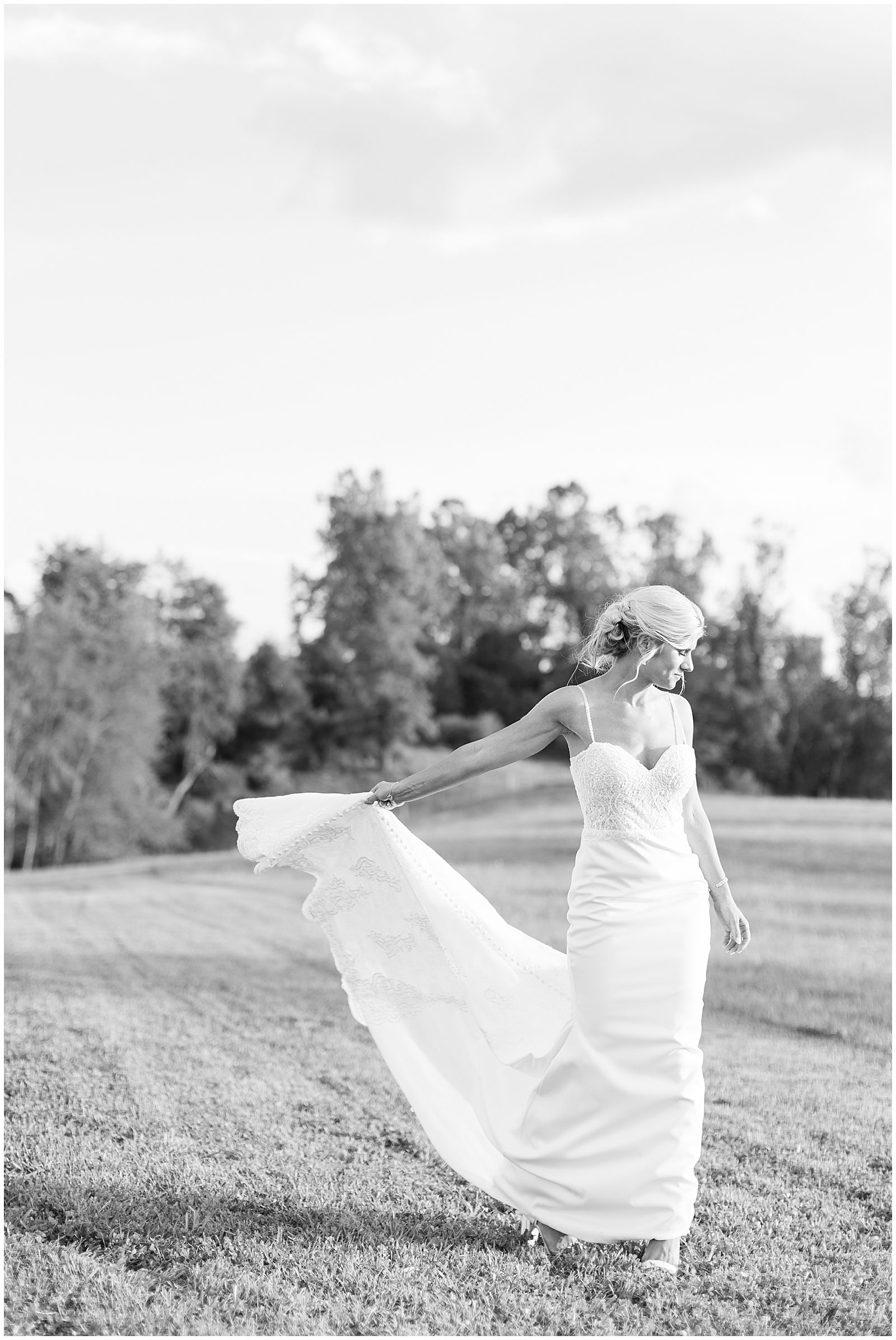 Black and White of Bride Twirling Photo