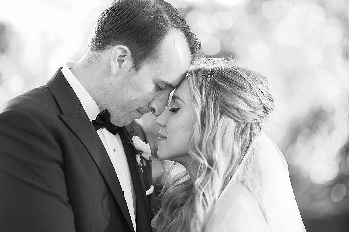 Black and White of Bride and Groom Nose to Nose Photo