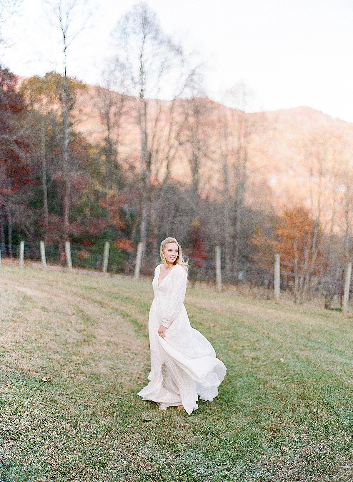 Bride with Dress Blowing in the Wind Photo