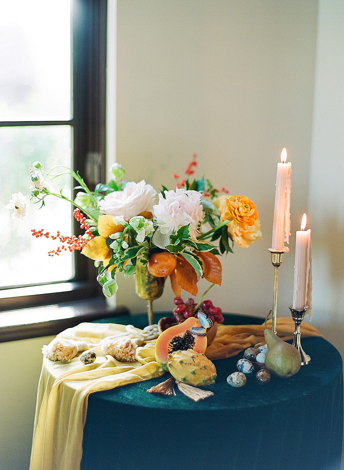 Dutch Inspired Still Life with Flowers Fruit and Candles Photo