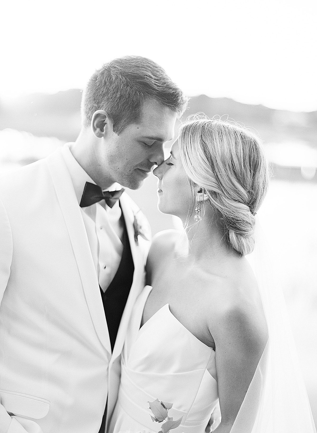 Wedding Venue In Charleston Black and White of Bride and Groom Nose to Nose Photo