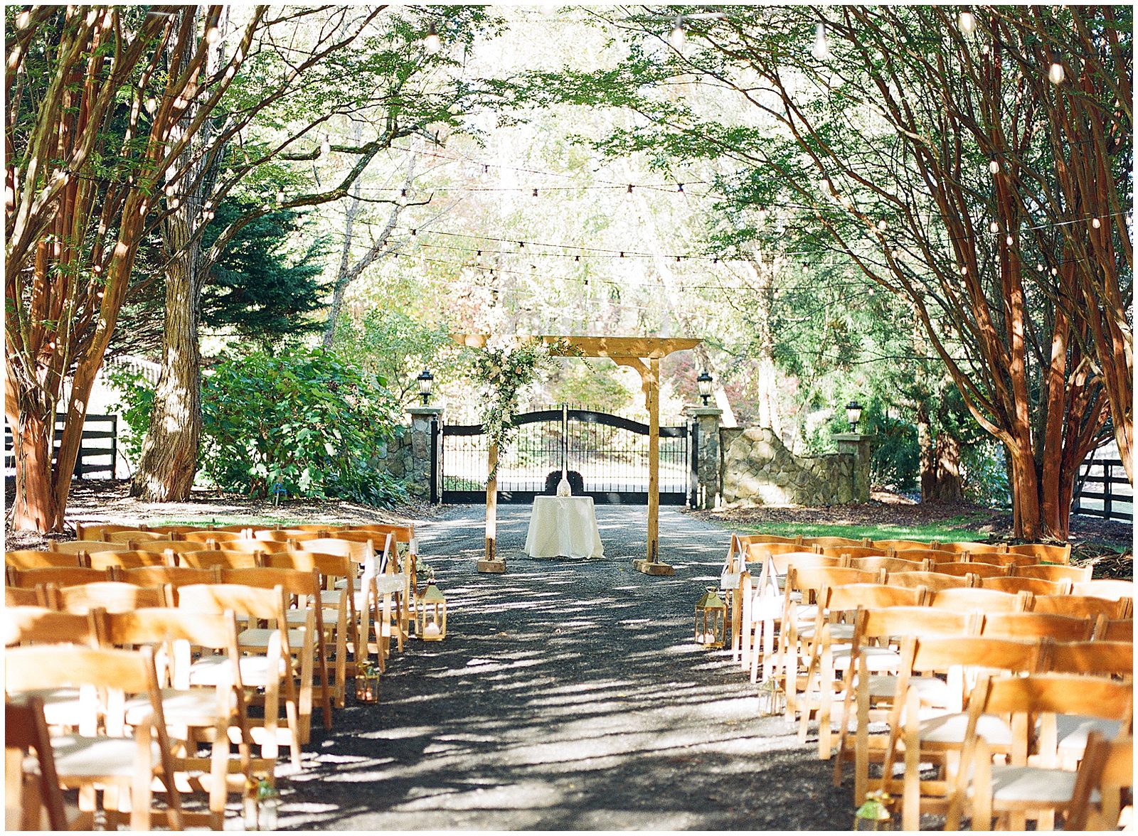 Fall Hawkesdene Wedding Ceremony Site in Driveway Under Trees Photo