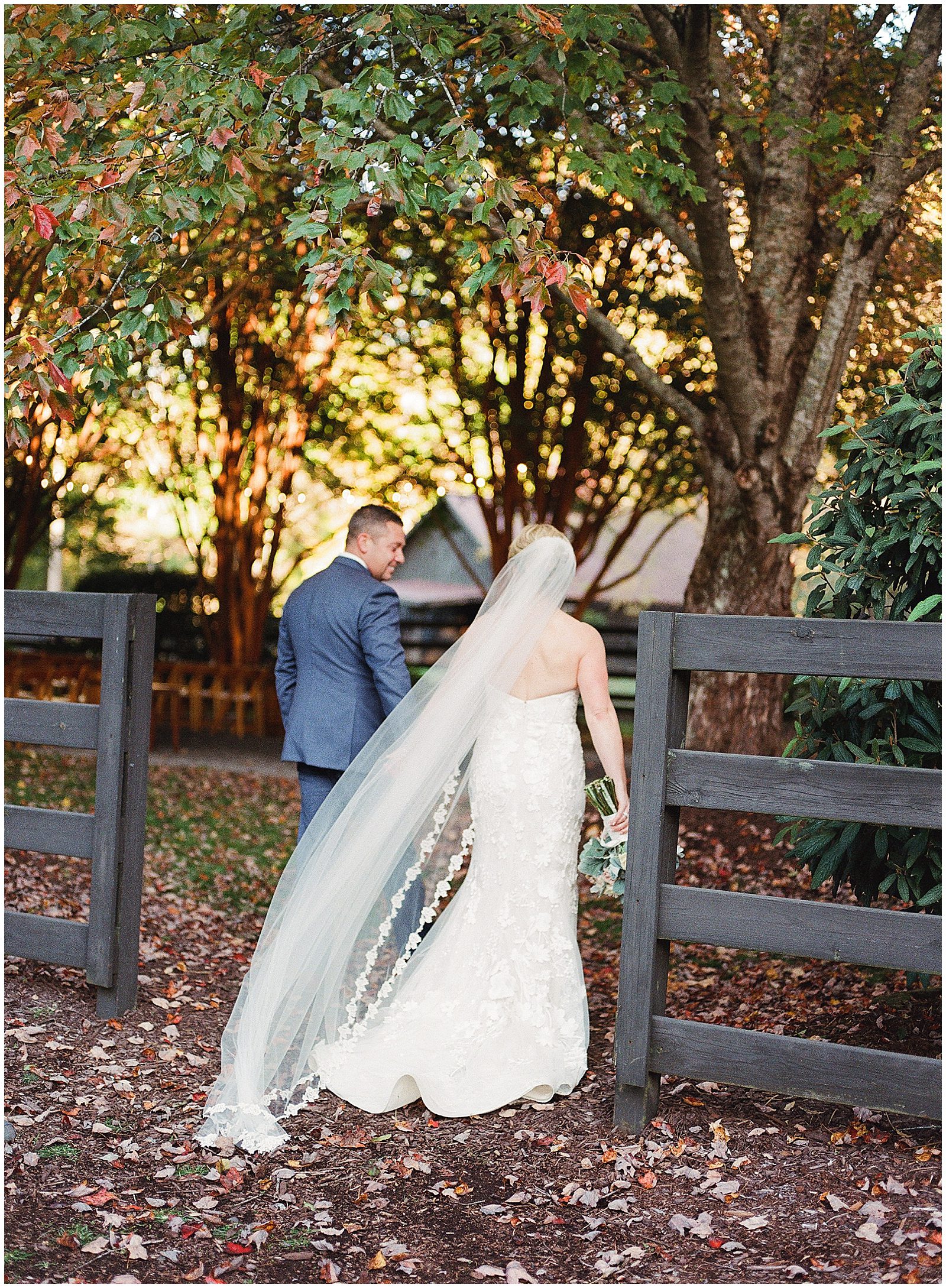 Fall Hawkesdene Wedding Bride and Groom Walking Through Gate Photo