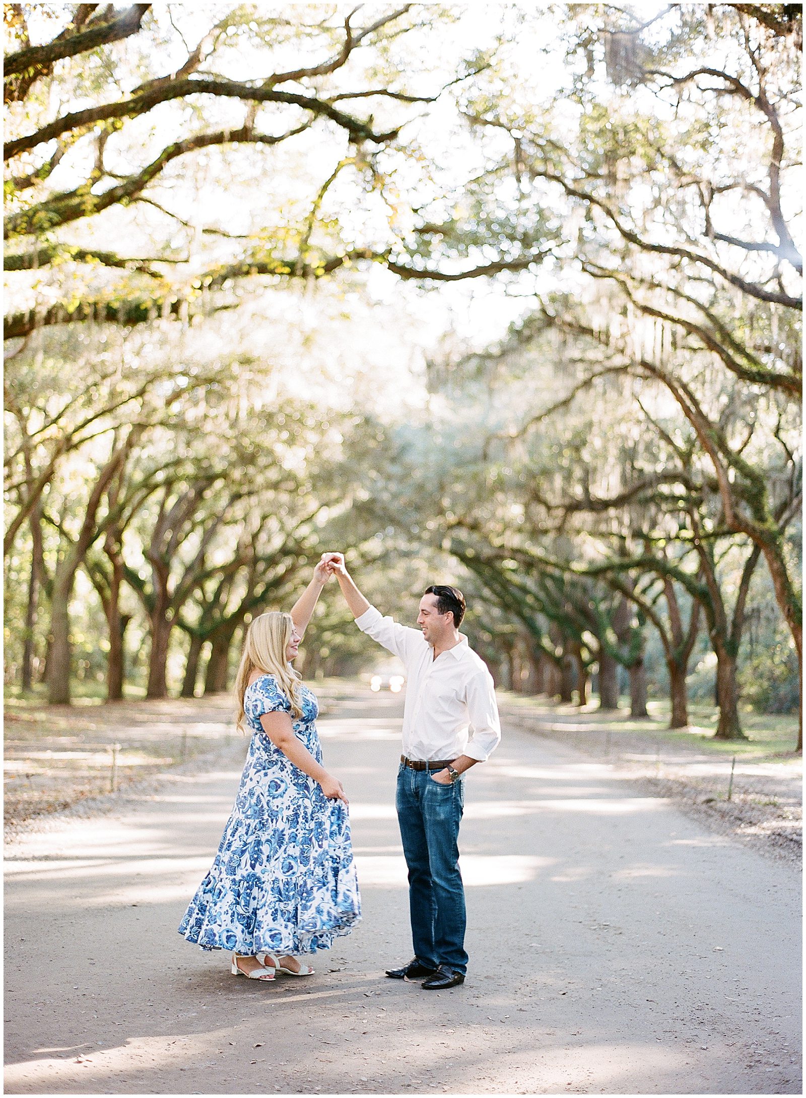 Couple Dancing In Driveway of Trees at Wormsloe Photo