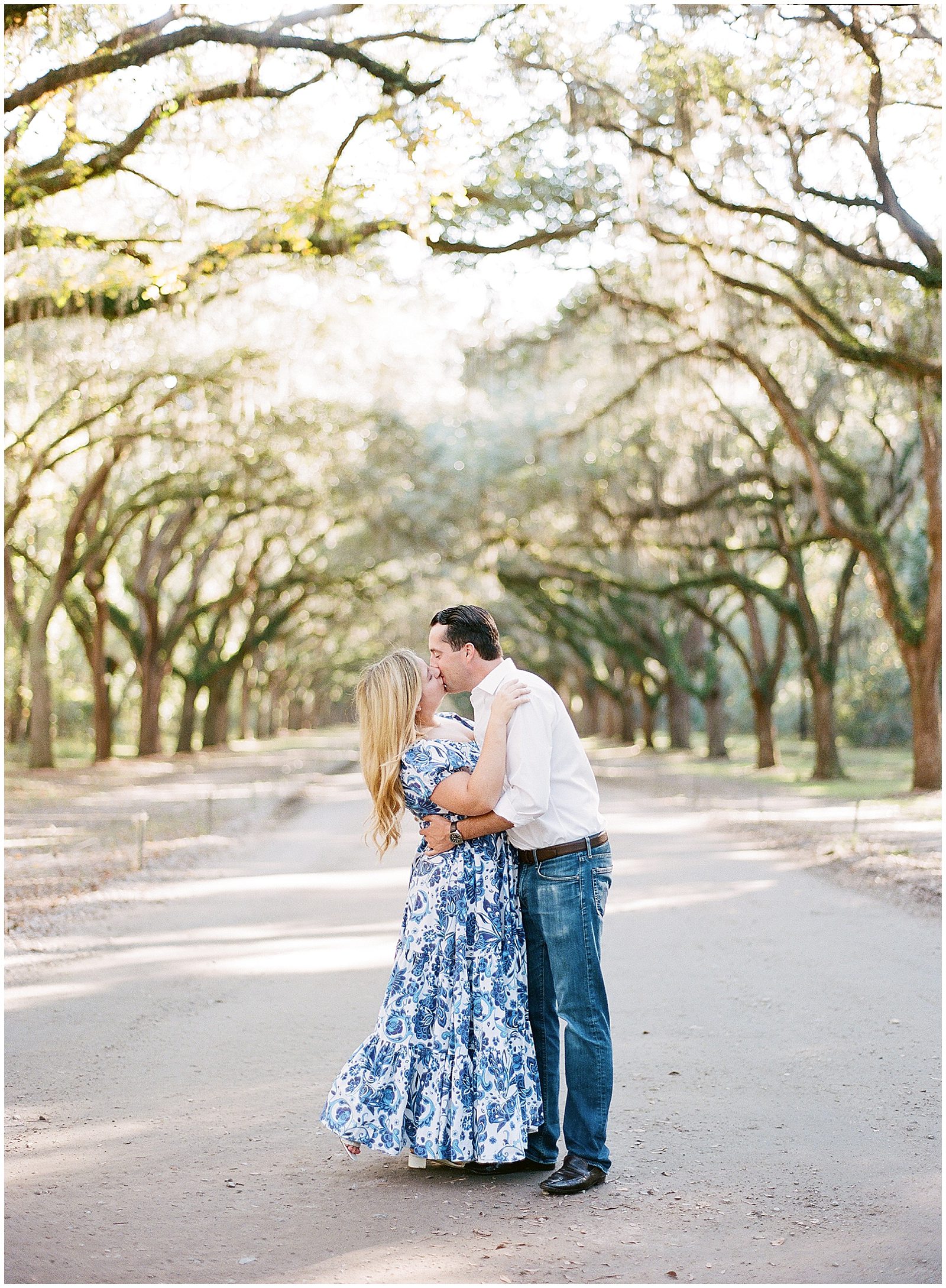Couple Kissing in Wormsloe Driveway Photo