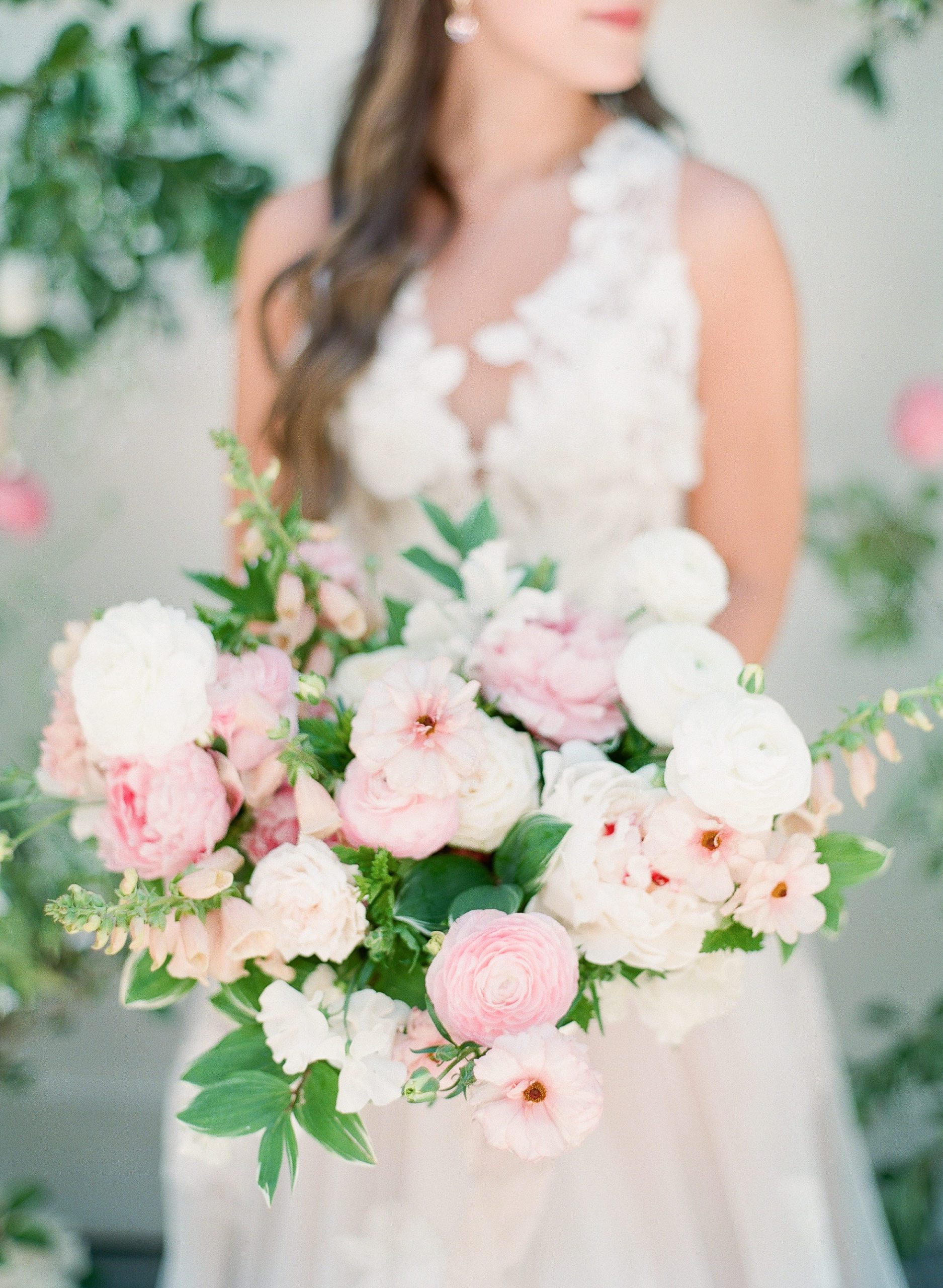 Wedding Bridal Bouquet Inspiration bride holding pink and white bridal bouquet photo